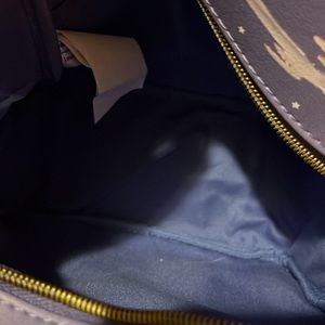 Disney Winnie the Pooh bag. Purple. Used twice.